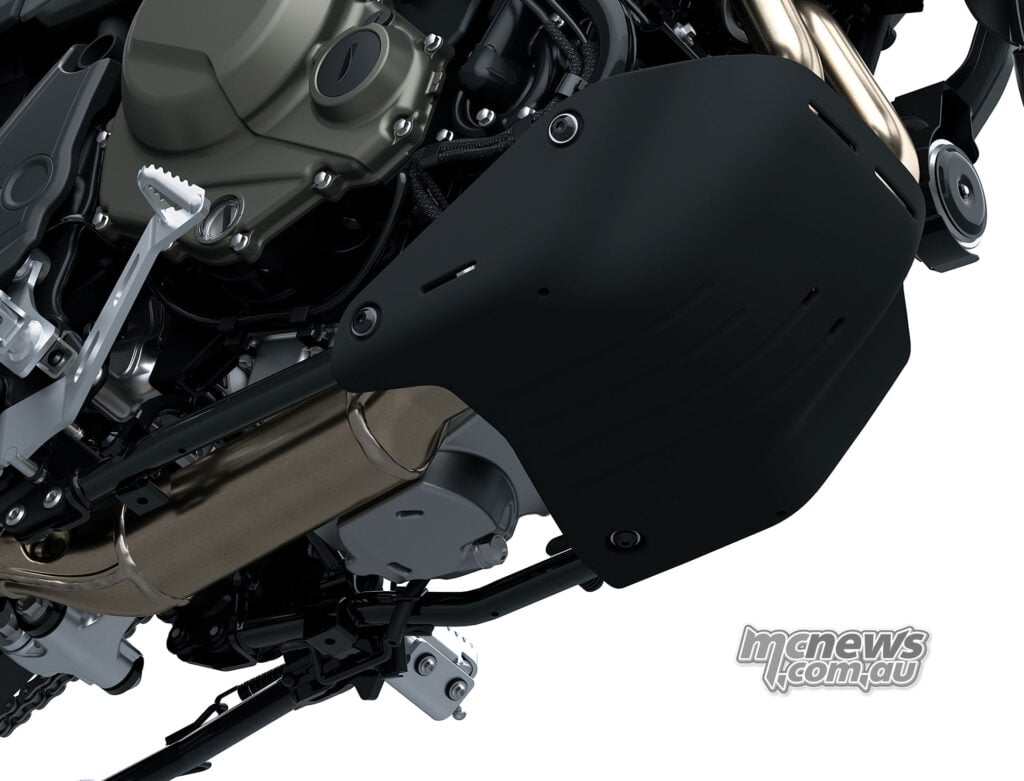 Black plastic skid plate beneath the engine and exhaust of the standard 2027 Kawasaki KLE650.