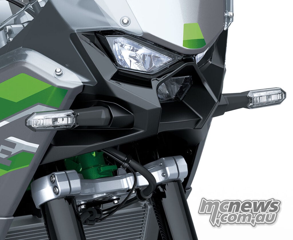 Close-up of the Kawasaki KLE650 SE triple LED headlight and front indicators.