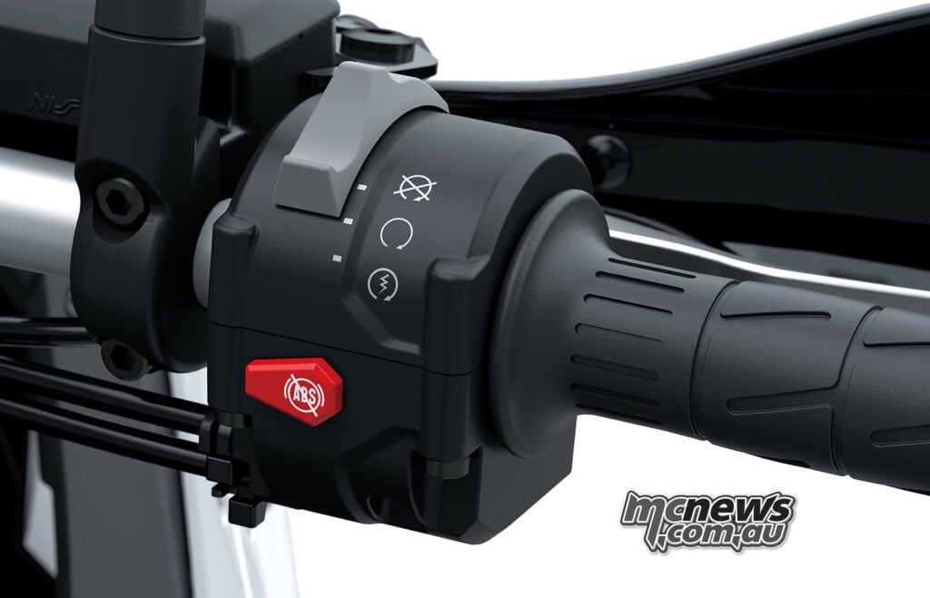 Right-hand Kawasaki KLE650 SE switchgear with a red ABS-off button beside the throttle grip.