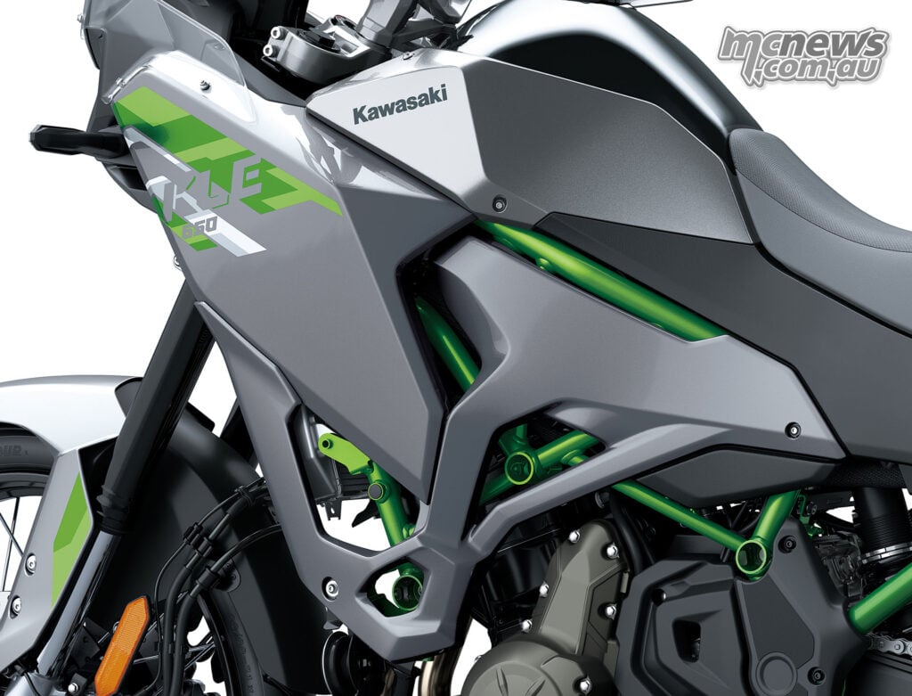 Side view of the Kawasaki KLE650 SE fuel tank, grey fairing panels and green trellis frame.