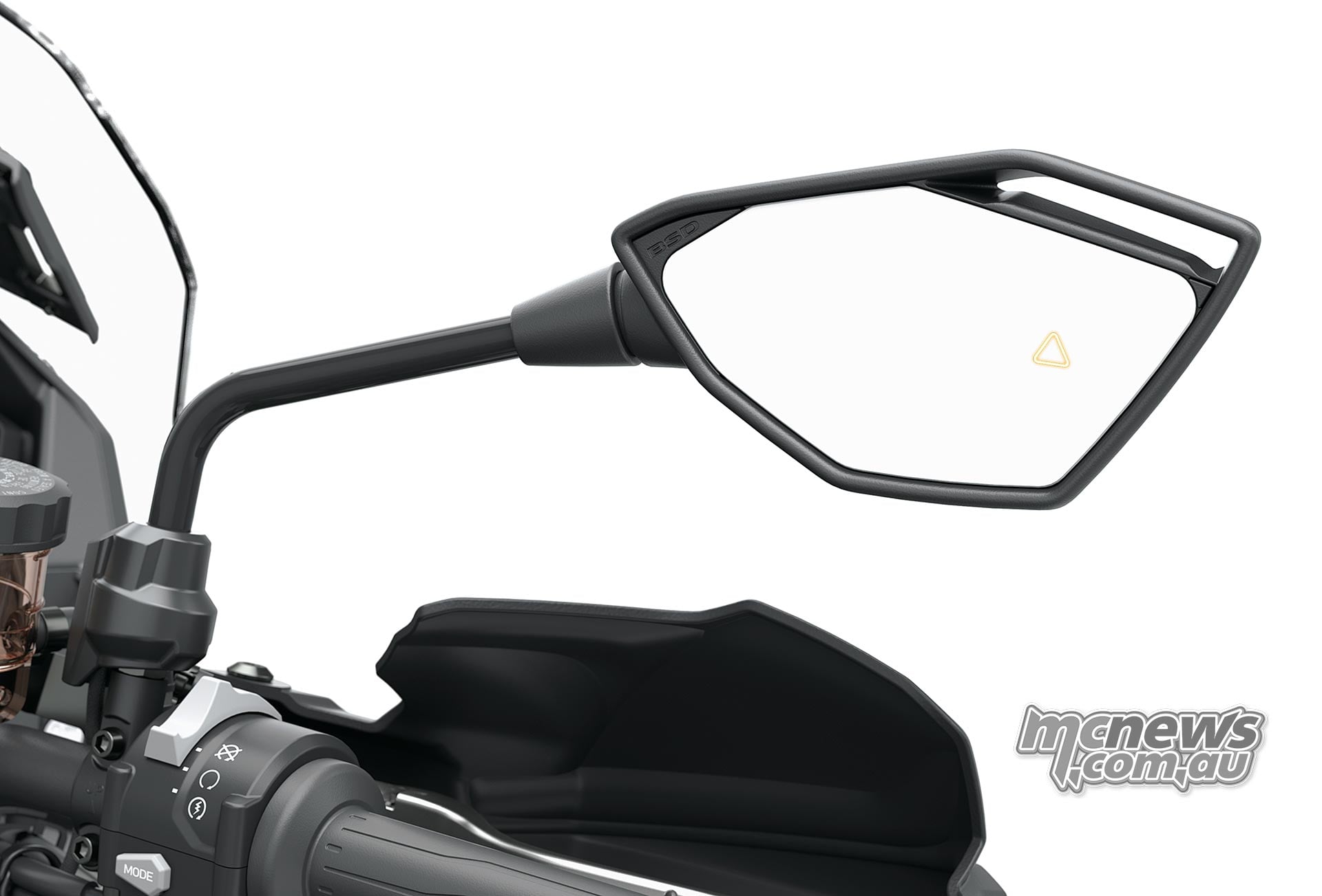 Kawasaki Versys 900 SE mirror with an illuminated amber triangular blind-spot warning above the right handguard