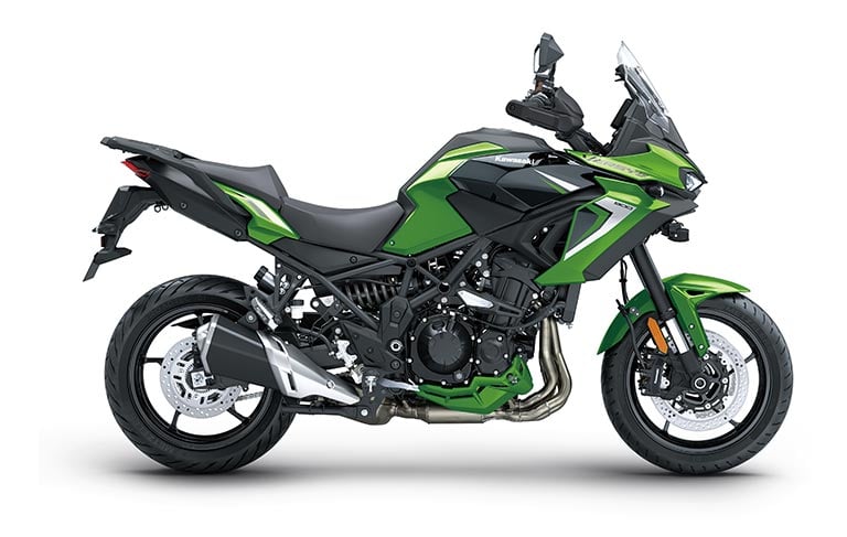 Right-side studio profile of the green and black 2027 Kawasaki Versys 900 SE