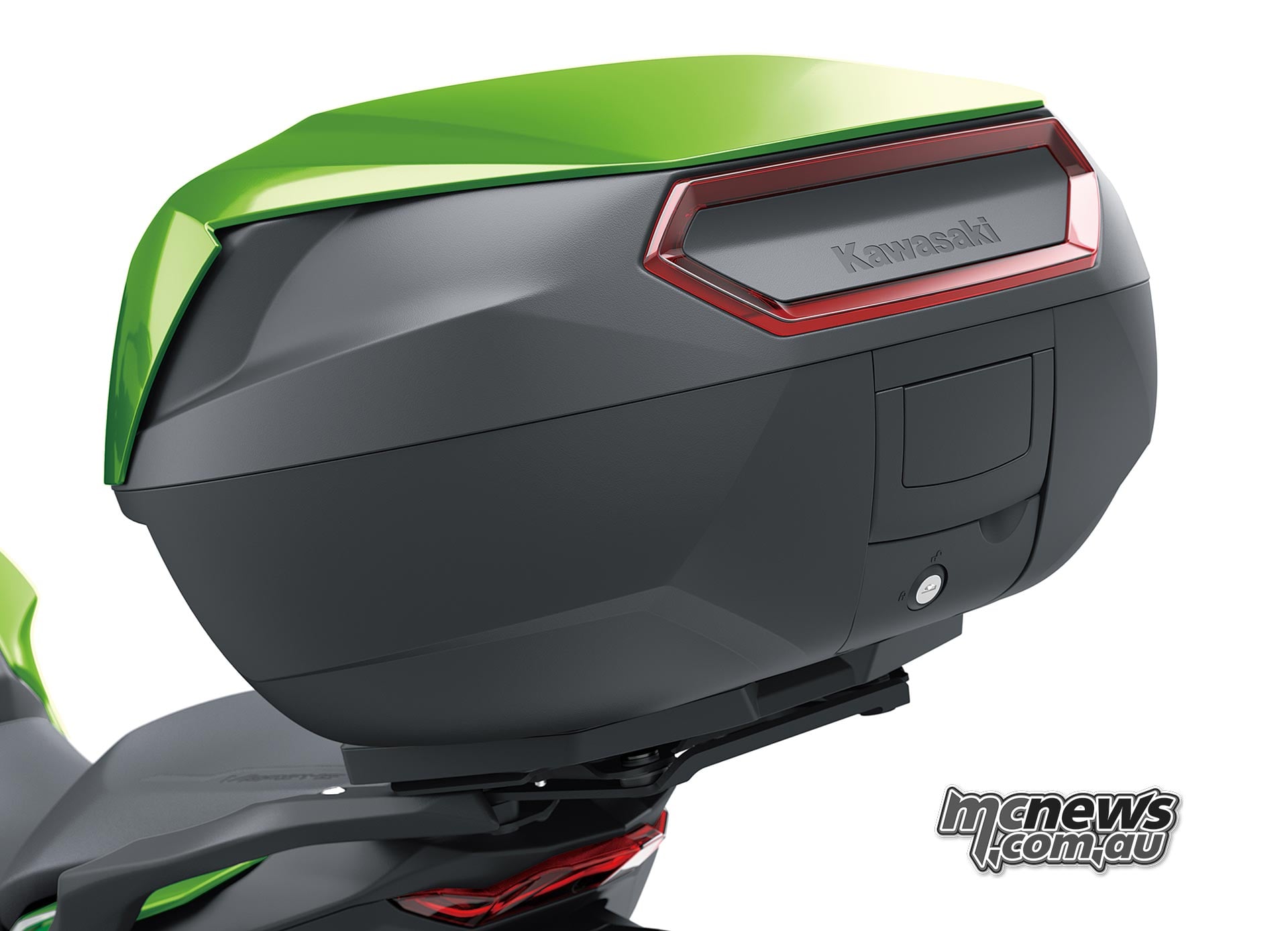 Green-topped Kawasaki hard top case fitted to the Versys 900 SE rear luggage rack