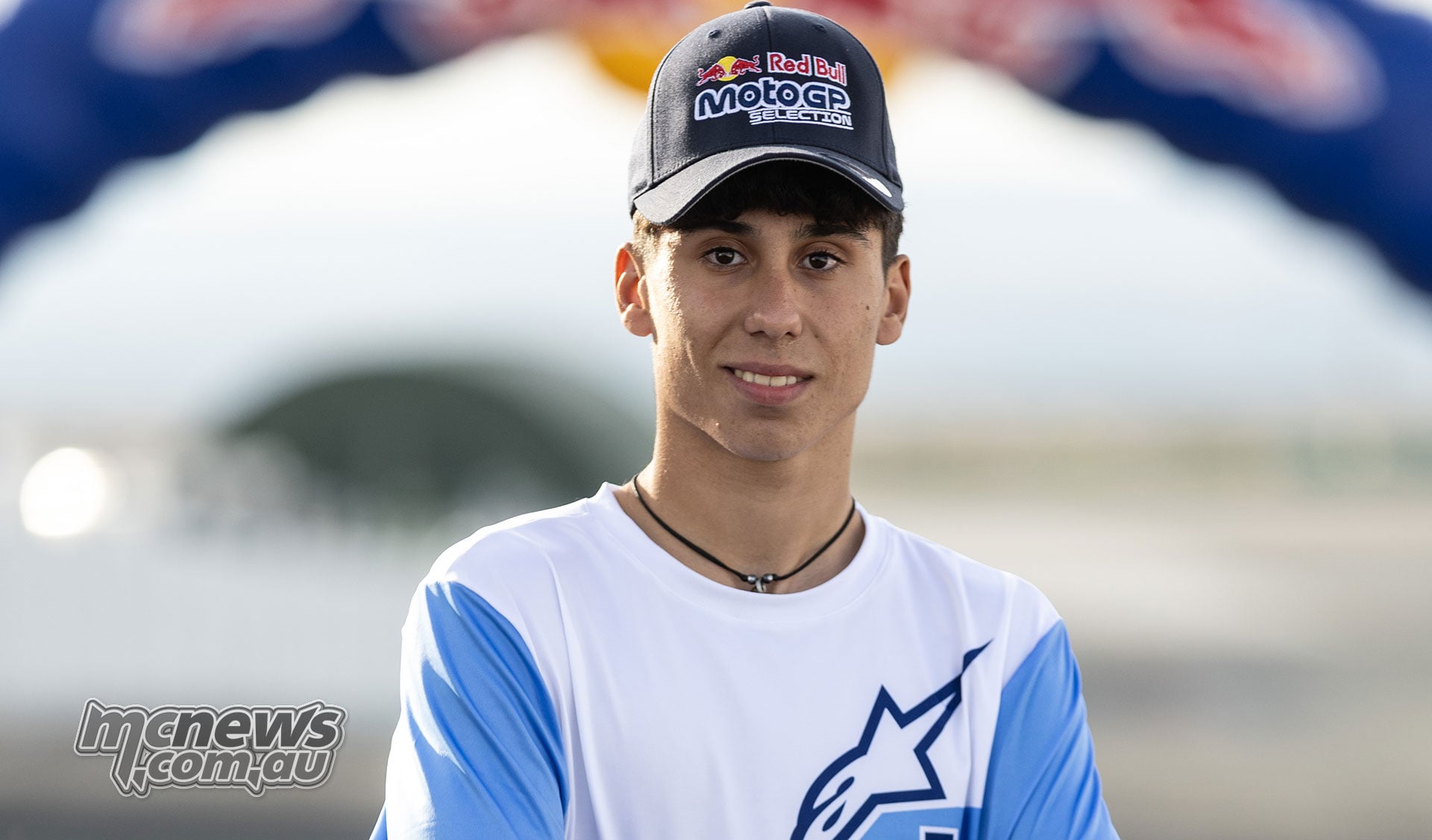 Spanish youngster Alvaro Lucas wearing a Red Bull MotoGP Selection cap and blue-sleeved Alpinestars shirt