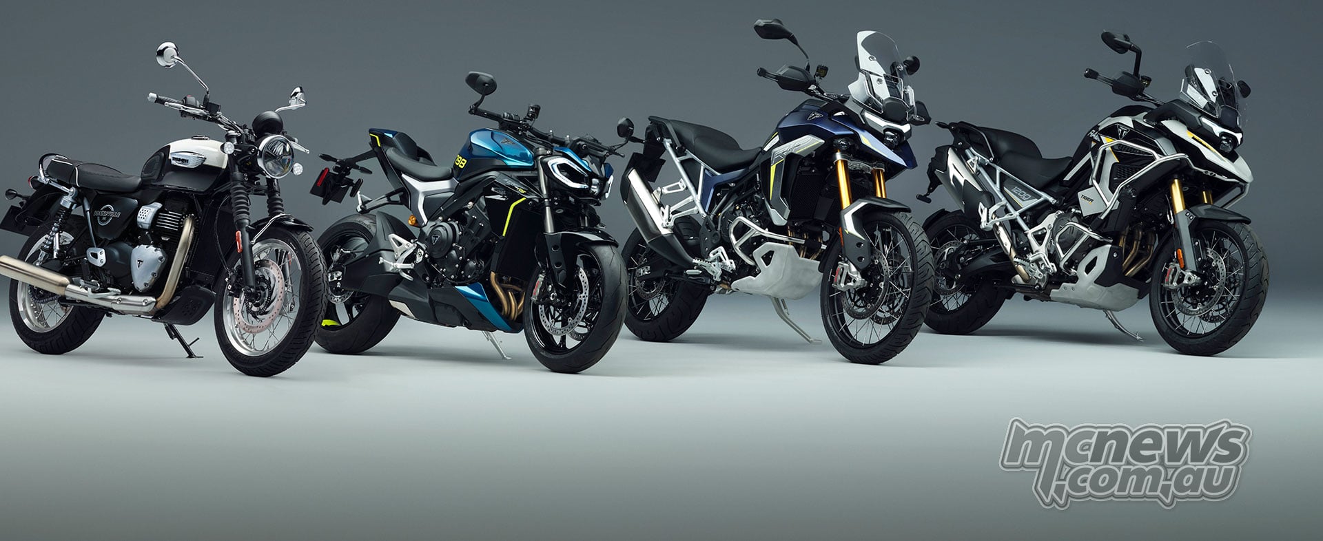 2027 Triumph Bonneville T40, Street Triple 798 RS, Tiger 900 Rally Pro and Tiger 1200 Rally Explorer lined up in a studio