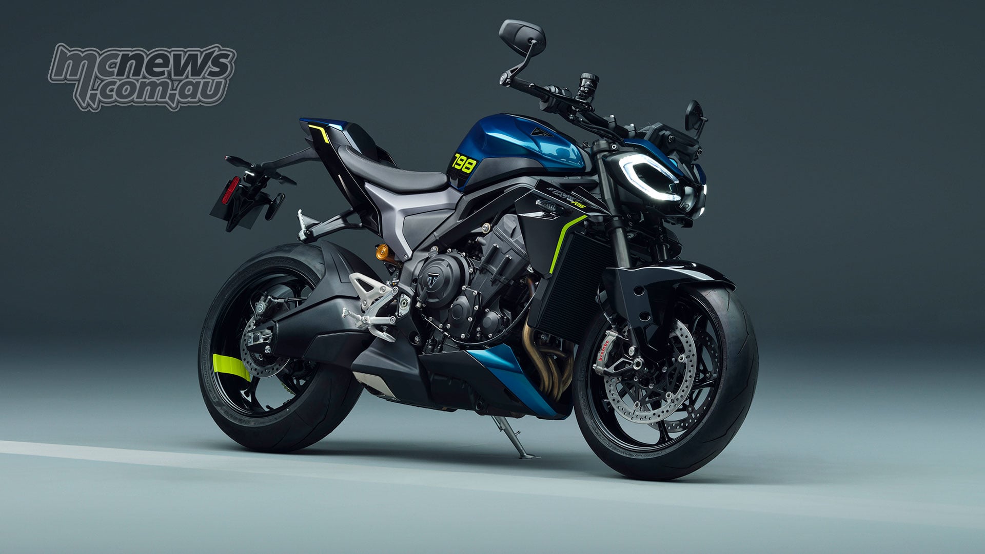 2027 Triumph Street Triple 798 RS from the front right showing its twin-element LED headlight and Brembo front brakes