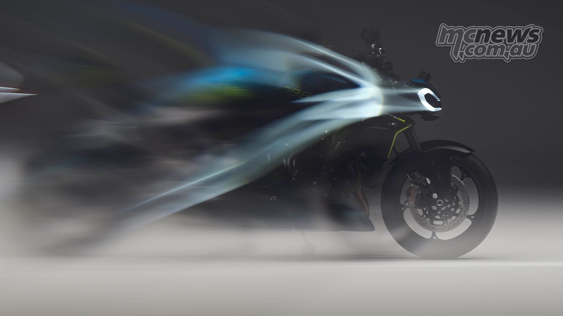 2027 Triumph Street Triple 798 RS partially obscured by motion blur in Triumph teaser imagery