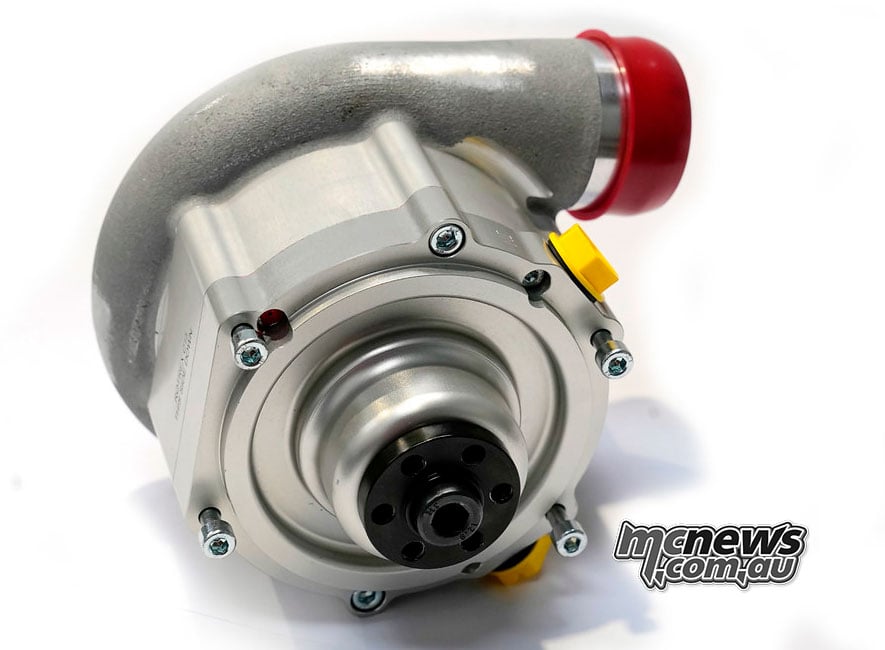 Rotrex C15-20 centrifugal supercharger with a drive pulley and red protective outlet cap.