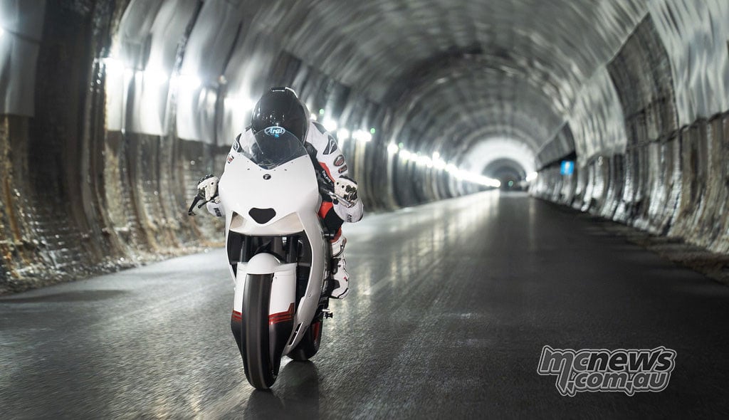 Head-on view of a rider on the Mono RR inside the illuminated Catesby Tunnel.