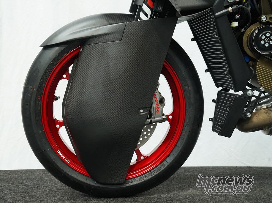 Carbon-fibre front-wheel bodywork, brake disc, fork shroud and cooling components on the Mono RR.