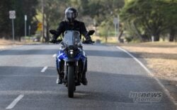 Different bars, narrower between the hands as well as being positioned slightly lower and further forward A taller front screen for a more comfortable touring bubble