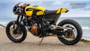 Side profile of Honda CB750 Hornet Sting Honey custom with yellow and black honeycomb bodywork