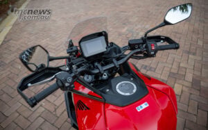 The TFT offers immense customisation and a useful USB-C port, although persuading it to display distance to empty permanently required some outside assistance from Google. Rider’s view of the Honda CB1000GT cockpit, TFT display, wide handlebar, mirrors and windscreen.