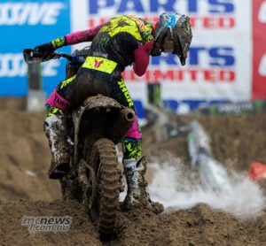 Cole Davies looks down at his stopped Yamaha as a white plume rises beside the bike on a muddy jump at Columbus.