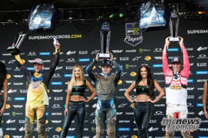 Ken Roczen, Haiden Deegan and Jorge Prado raise their trophies on the Columbus 450 overall podium.