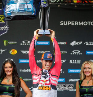 Jorge Prado raises his third-place trophy above his head on the Columbus SMX podium.