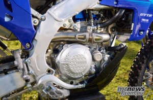 The 450 cc reverse-fed engine retains its fundamental architecture, but revised intake-port design, cam timing and increased magneto inertia target smoother low-to-midrange delivery and greater stall resistance. 2027 Yamaha WR450F 450 cc four-stroke engine and aluminium frame