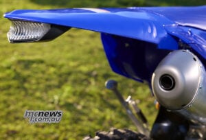 Australian WR450Fs remain fully ADR compliant, while every bike is also supplied with a closed-course off-road kit that includes a lightweight LED tail-light and licence-plate holder. 2027 Yamaha WR450F rear fender, LED tail-light and exhaust silencer