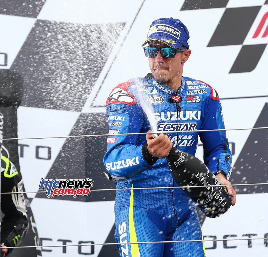 Maverik Vinales sprays the champagne at Silverstone in 2016 after taking Suzuki's first victory in almost a decade. Image by AJRN
